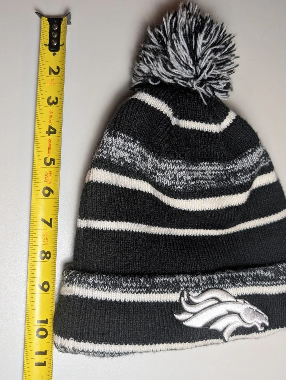 New Era Denver Broncos Black, Gray & White Pom Cuffed Beanie with Team Patch